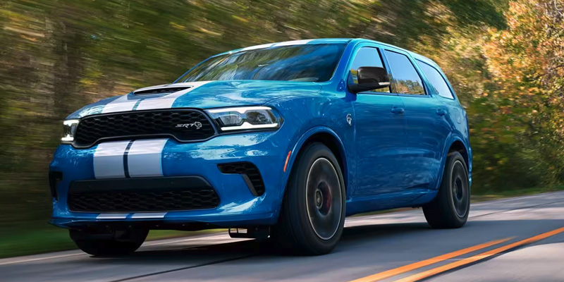 2024 Dodge Durango in blue with white racing stripes
