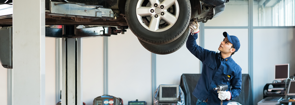 Mechanic working on a car