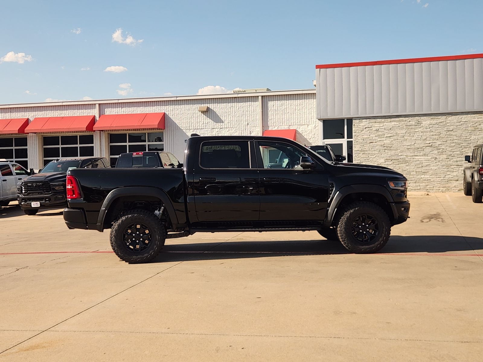 2026 RAM Ram 1500 RAM 1500 RHO CREW CAB 4X4 5'7' BOX